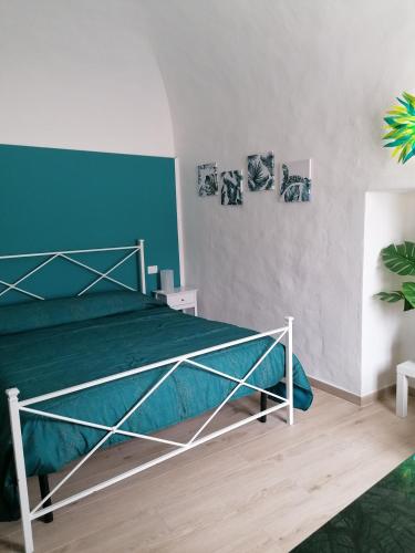 Postel nebo postele na pokoji v ubytování Camera Botanica
