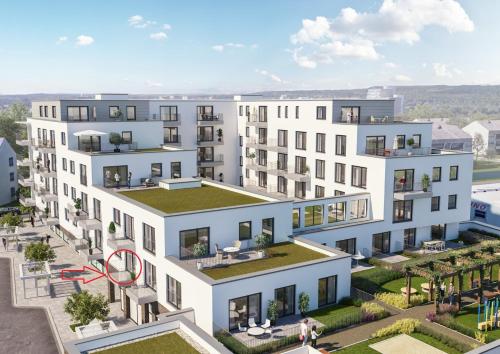 an aerial view of a white apartment building at Home2Cologne in Kerpen