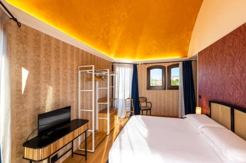Voodi või voodid majutusasutuse Hotel Atlanta Augustus toas