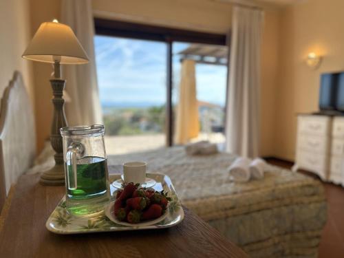 a tray of fruit on a table in a hotel room at Villa Camilla-Stintino, Sardegna in Sassari