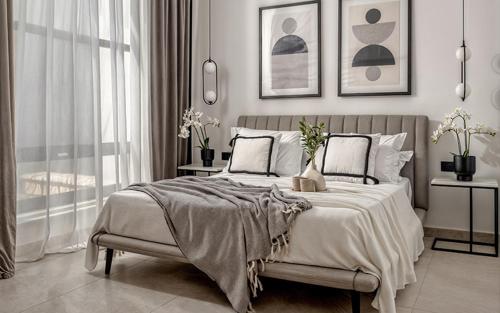 a white bedroom with a large bed and a window at The White Luxury Villa - Private Seaview Villa with Pool by Villa Mana Gers in Vasilikos