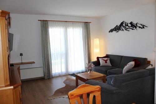 Posezení v ubytování Ferienhaus Nr 17, Kategorie Komfort, Feriendorf Hochbergle, Allgäu