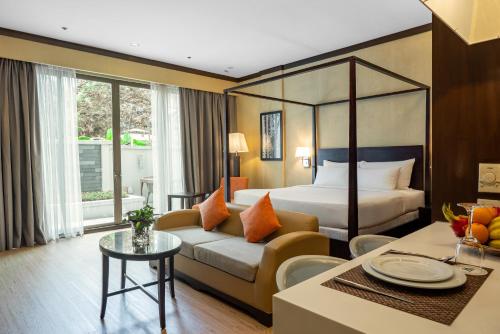 Postel nebo postele na pokoji v ubytování Micasa All Suites Hotel