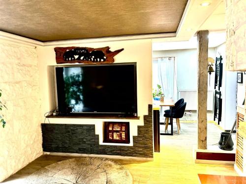 Televisyen dan/atau pusat hiburan di Ferienwohnung Meise