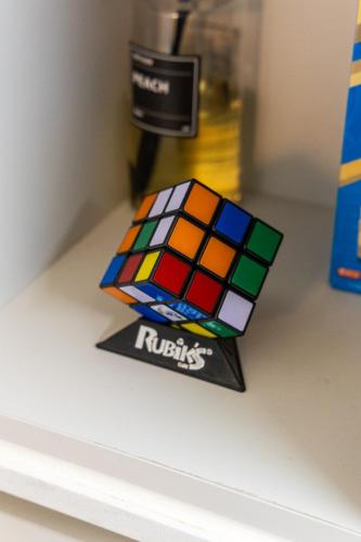 a rubix cube toy sitting on a shelf at Gwangan antique summer accommodations the ocean in Busan