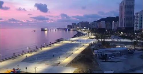 a view of a city with a beach in the water at Colombia Apartments&Rooms in Durrës