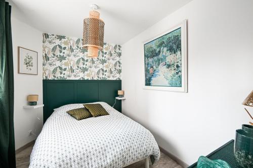 Postel nebo postele na pokoji v ubytování L'échappatoire - A 300 m de la plage