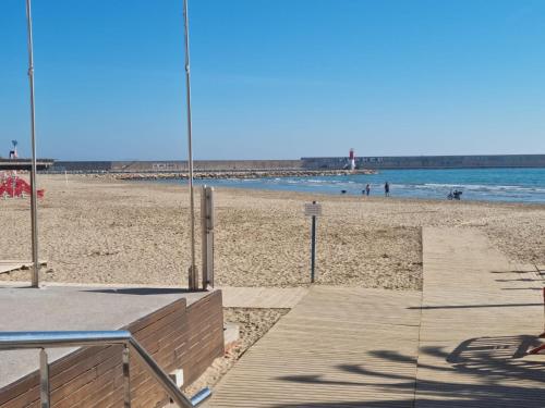 a view of a beach with people in the water at RELAX-Apt in Benicarló