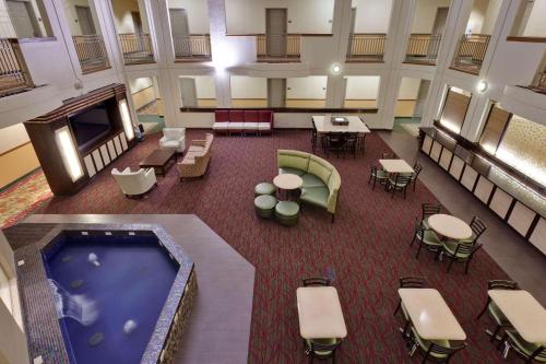 an overhead view of a hospital lobby with a hot tub at Country Inn & Suites by Radisson, San Carlos, CA in San Carlos