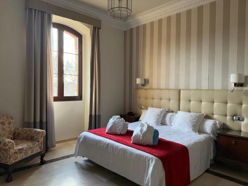 Postel nebo postele na pokoji v ubytování Hotel Termas Balneario Termas Pallares