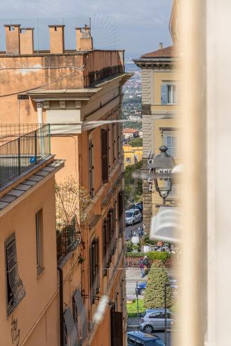 a view of a city street from a building at Pupazza House, intero appartamento nel cuore di Frascati in Frascati