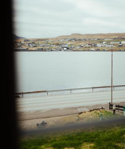 a view of a body of water from a window at Greystone House / Historic / Traditional / Unique in Saltnes