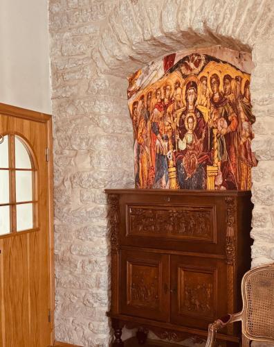 a large painting on a wall in a room at House-Museum #Medieval unique experience in Tallinn