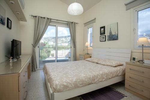 Foto The Marilouize Apartment 2