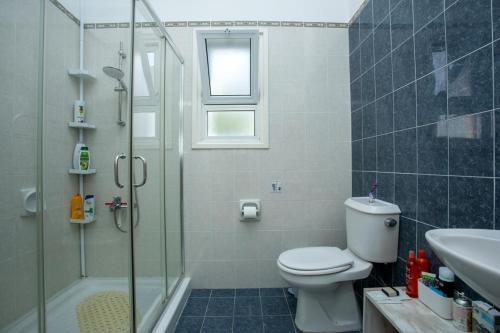 Foto The Marilouize Apartment 3