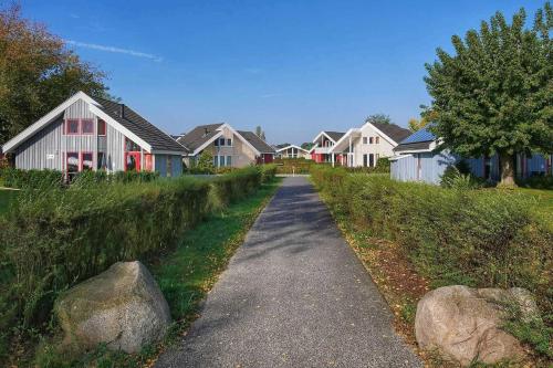 a residential street with a row of houses at Ferienpark Scharmützelsee in Wendisch Rietz