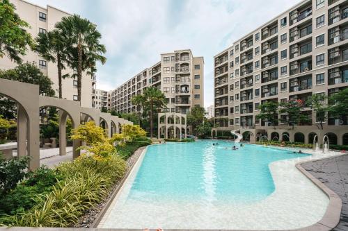 an image of a large swimming pool with buildings at Lacasita Near Beach Huahin (Room652) in Hua Hin