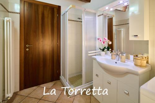 Kúpeľňa v ubytovaní Appartamento La Torretta
