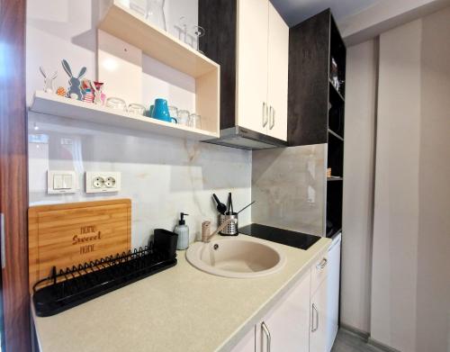 Kuchyň nebo kuchyňský kout v ubytování Malavi DV34 top center apartment Ruse