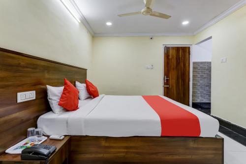 Katil atau katil-katil dalam bilik di Collection O Srinivasa Residency