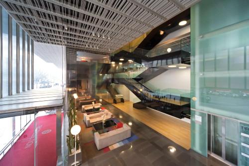 an overhead view of the lobby of a building at NH Collection Barcelona Constanza in Barcelona