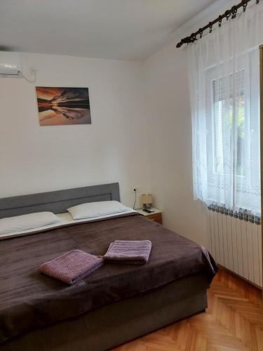 Katil atau katil-katil dalam bilik di Elena Rooms