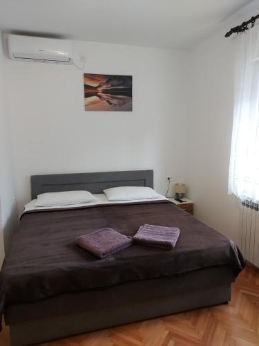 Katil atau katil-katil dalam bilik di Elena Rooms