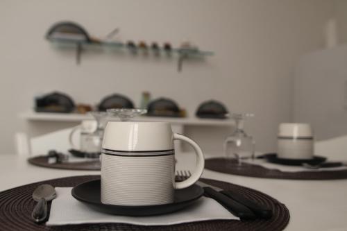 Příslušenství pro přípravu čaje a kávy v ubytování Giobo Rooms