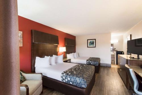 Ένα ή περισσότερα κρεβάτια σε δωμάτιο στο Econo Lodge North Washington