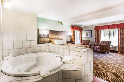 a large bathroom with a large tub in a room at Quality Inn Black Mountain-Asheville East in Black Mountain