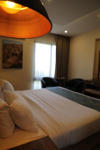 Letto o letti in una camera di Post Boutique Hotel Amman