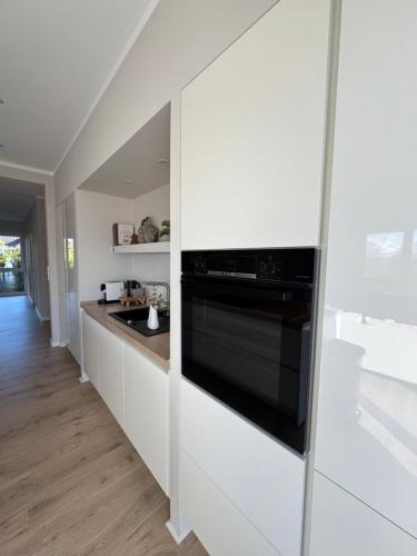 Una cocina o cocineta en Sonniges Design-Apartment nahe Hamburg - Ruhe, Komfort & kostenloses Parken
