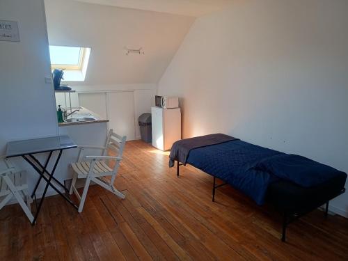 Katil atau katil-katil dalam bilik di Le GM - appartement proche gare et commerces