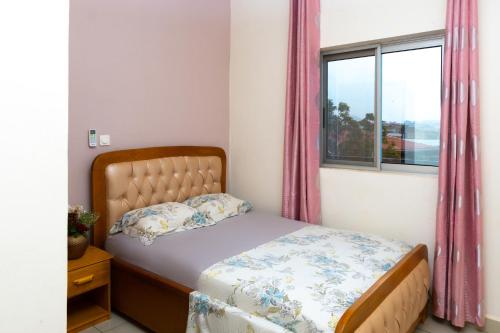 Postel nebo postele na pokoji v ubytování Residence la Flamboyance