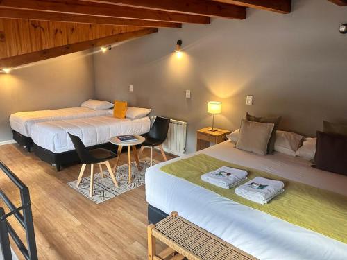 Кровать или кровати в номере Desierto Suites