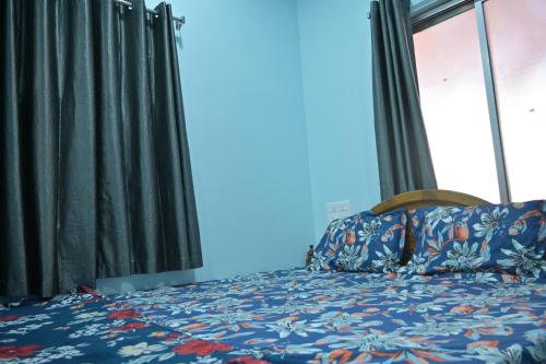 Postel nebo postele na pokoji v ubytování Alice Homestay