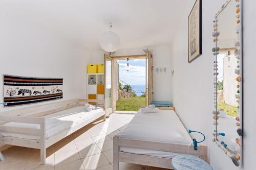 Ένα ή περισσότερα κρεβάτια σε δωμάτιο στο Sa Craba Aresti