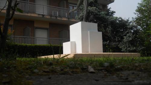 a white sculpture in front of a building at Hotel Diana in Cassino