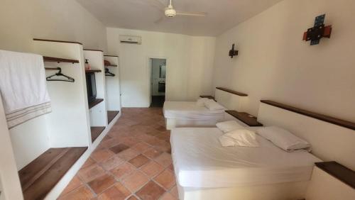 Una cama o camas en una habitación de Casa finca Andrea