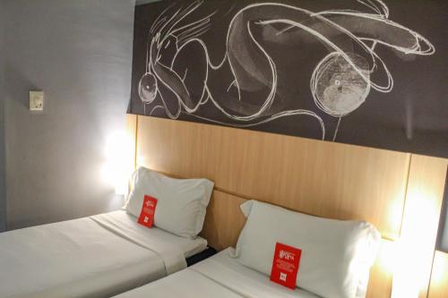 ibis Goiâniaにあるベッド