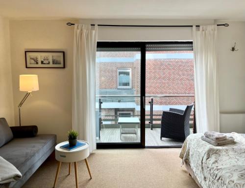 Ένα ή περισσότερα κρεβάτια σε δωμάτιο στο Appartementhaus Seemöwe Zwergmöwe