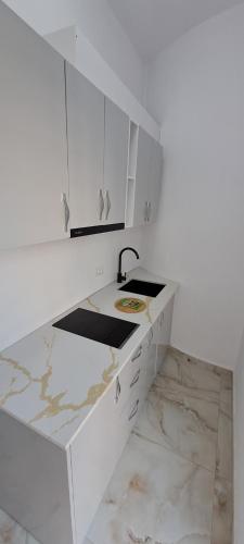 Kuchyň nebo kuchyňský kout v ubytování Te Flamuri Holiday Apartments