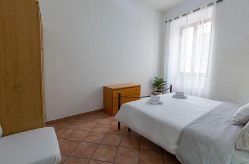 Postel nebo postele na pokoji v ubytování Paradise Home Centro Storico Ascoli Piceno