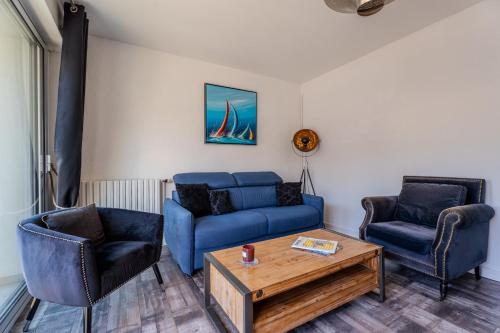 Posedenie v ubytovaní Appartement Moderne & Confort Accès Plage et Commerces