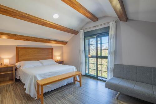 Giường trong phòng chung tại Casa Torrevella