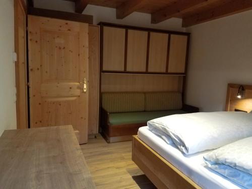 Postel nebo postele na pokoji v ubytování Chalet Mittersill
