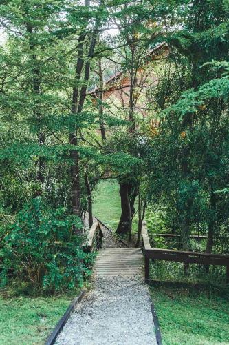 Un jardín fuera de Arbolar, Casas de Montaña- Piscina climatizada