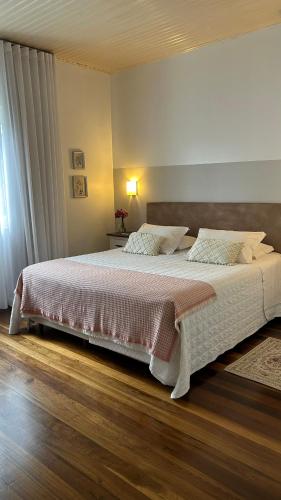 Katil atau katil-katil dalam bilik di Hotel Jardim Bulevard