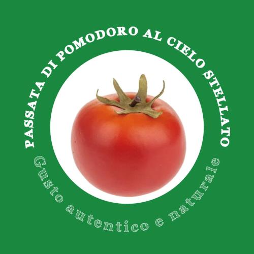 a picture of a tomato on a green and white plate at Agricampeggio AL CIELO STELLATO in Valeggio sul Mincio