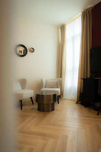 Μια τηλεόραση ή/και κέντρο ψυχαγωγίας στο Hotel Grand Place